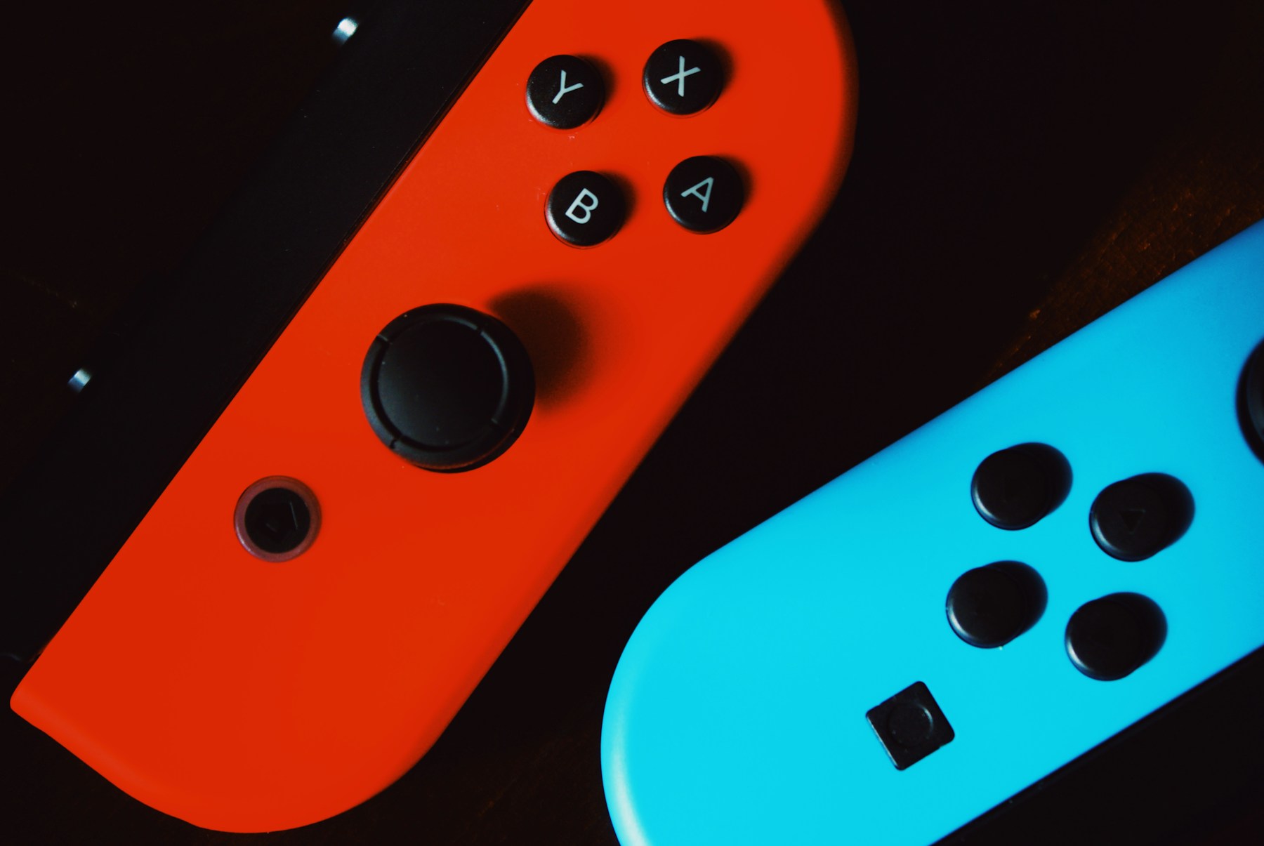 Close-up of red and blue Joy-Con controllers